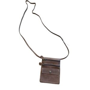 Roots Brown Leather mini  Crossbody Bag in like new condition